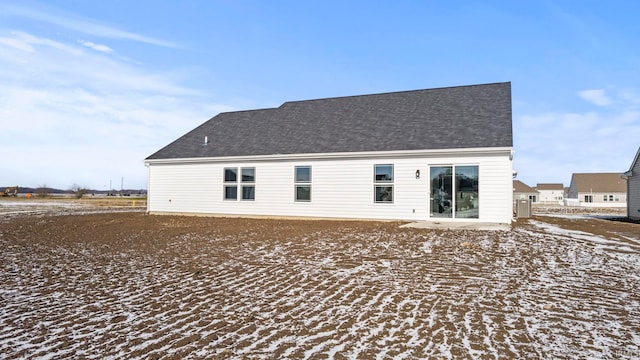 view of snow covered house