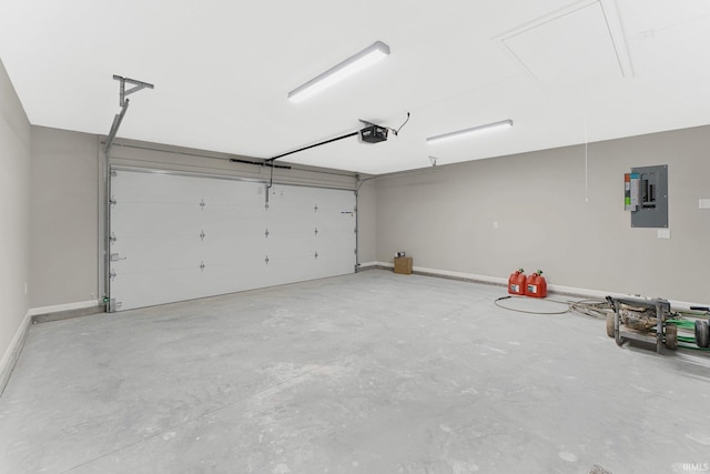 garage featuring a garage door opener and electric panel