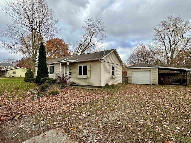 view of property exterior with a garage and an outdoor structure