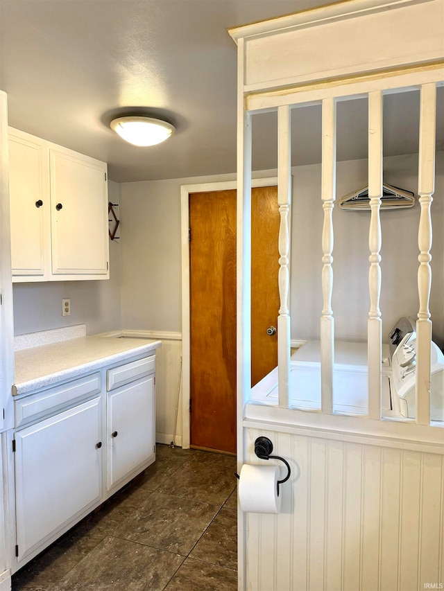 kitchen featuring white cabinets