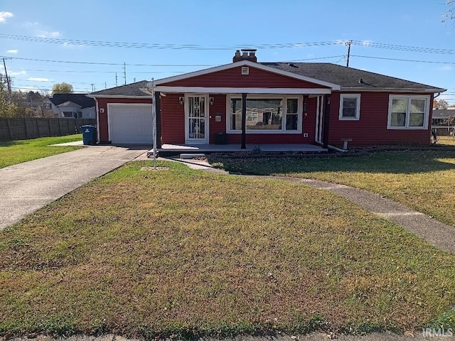 single story home featuring a front lawn, a garage, and covered porch