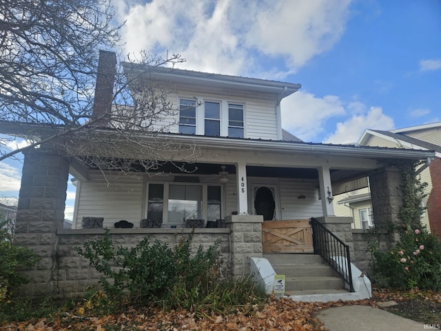 view of front of property featuring covered porch