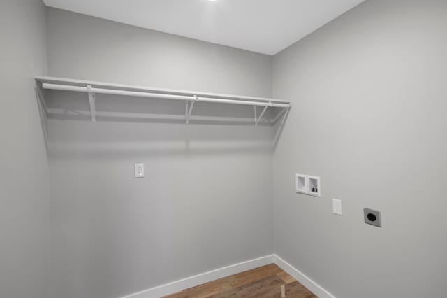 laundry room featuring hookup for an electric dryer, hookup for a washing machine, and hardwood / wood-style flooring