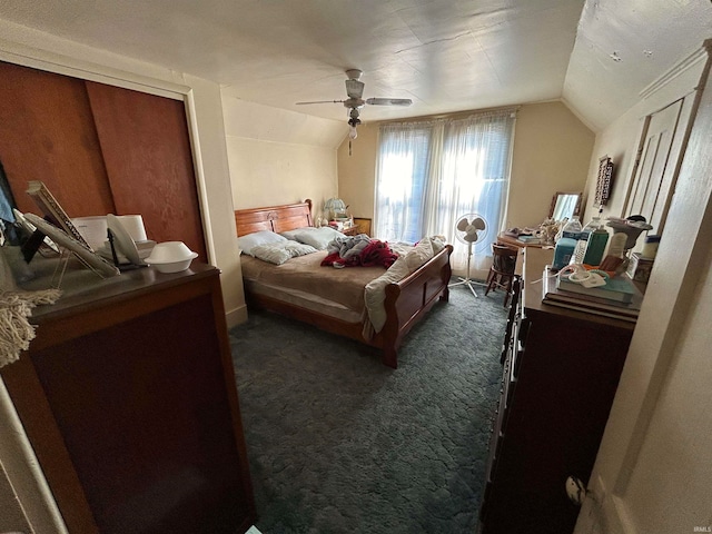 carpeted bedroom featuring ceiling fan and lofted ceiling