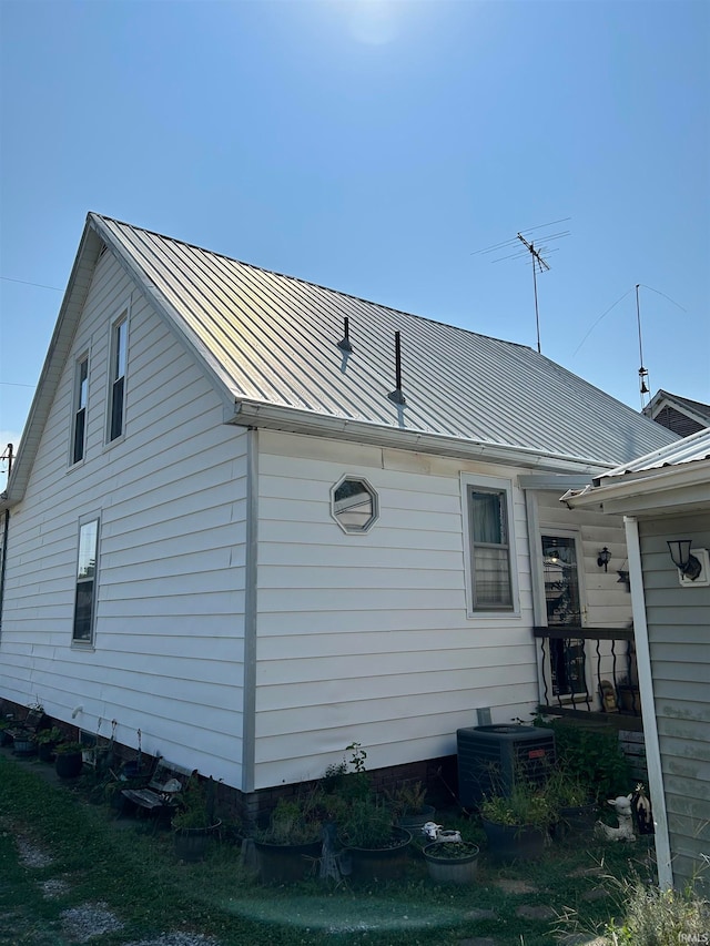 view of property exterior featuring cooling unit