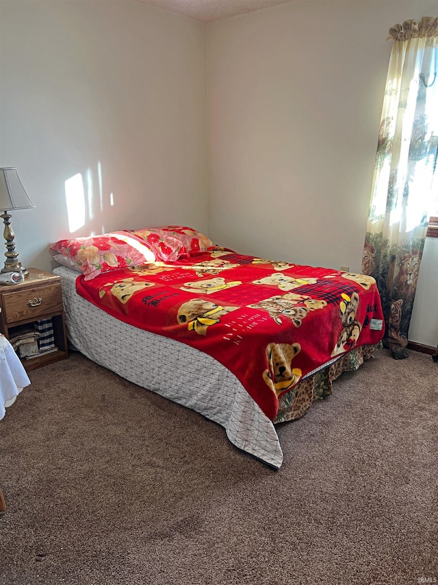 bedroom featuring carpet flooring