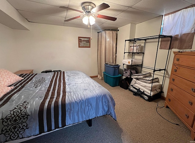 bedroom featuring ceiling fan and light carpet