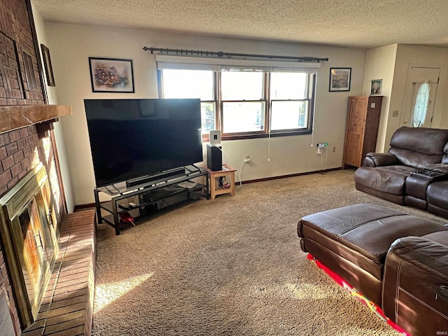 carpeted living room with a fireplace and a textured ceiling