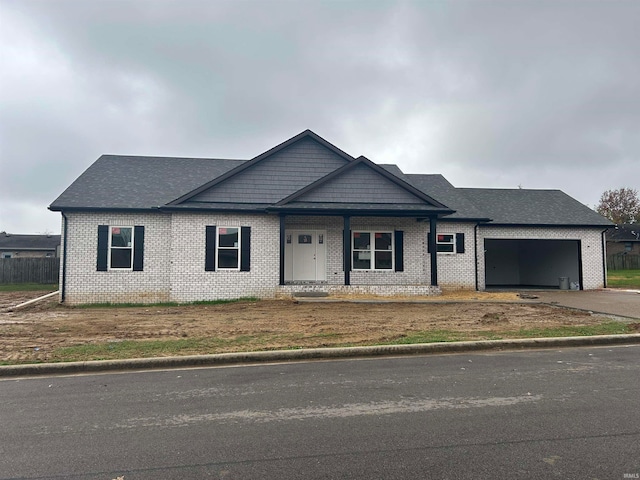 view of front of property with a garage