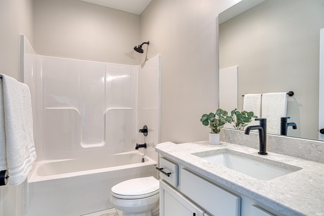 full bathroom featuring vanity, toilet, and tub / shower combination