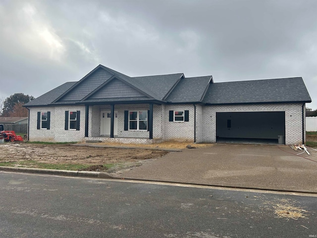 view of front of property featuring a garage