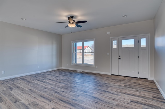 entrance foyer with wood-type flooring and ceiling fan