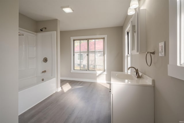 bathroom with vanity, shower / bathtub combination, and hardwood / wood-style floors