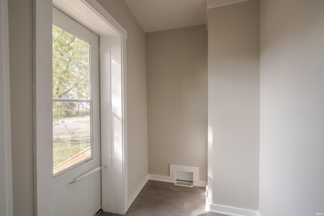 spare room with hardwood / wood-style floors