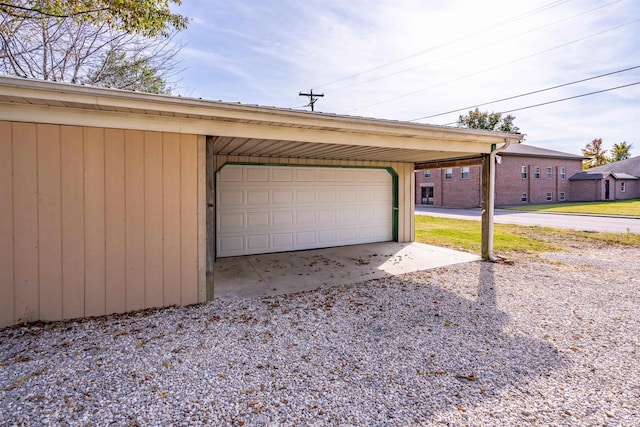 garage featuring a carport