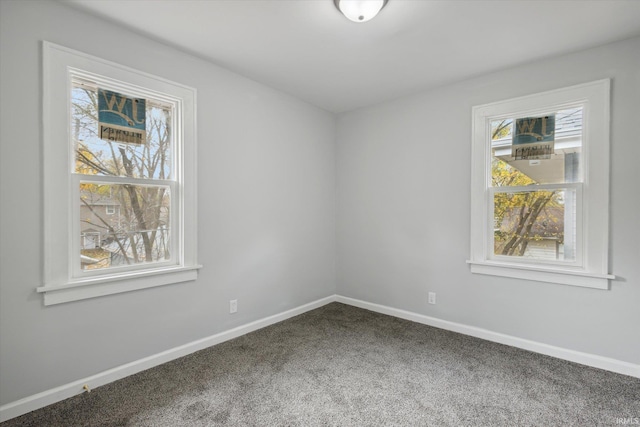 empty room with carpet flooring