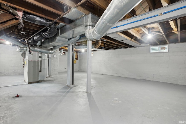 basement featuring heating unit