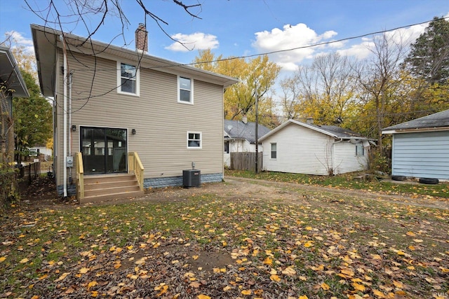 back of property with cooling unit