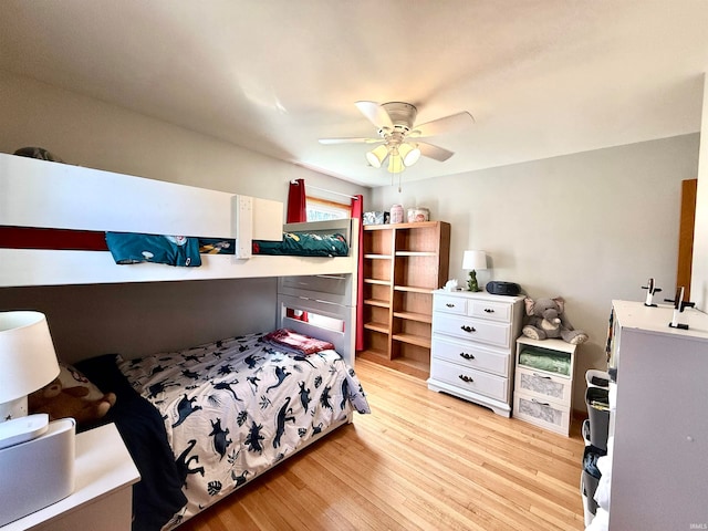 bedroom featuring ceiling fan and light hardwood / wood-style flooring