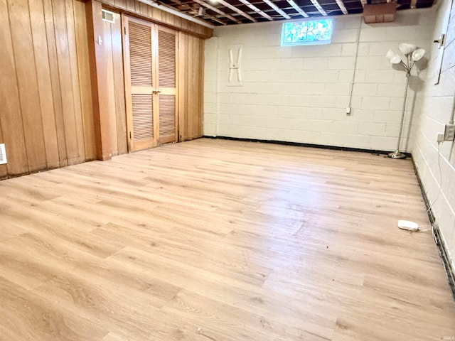 basement with light wood-type flooring