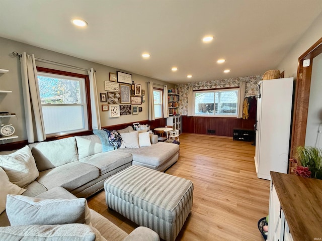 living room with light hardwood / wood-style flooring