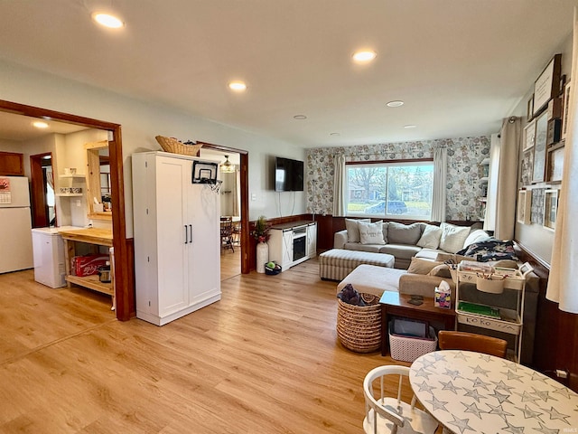 living room with light hardwood / wood-style floors