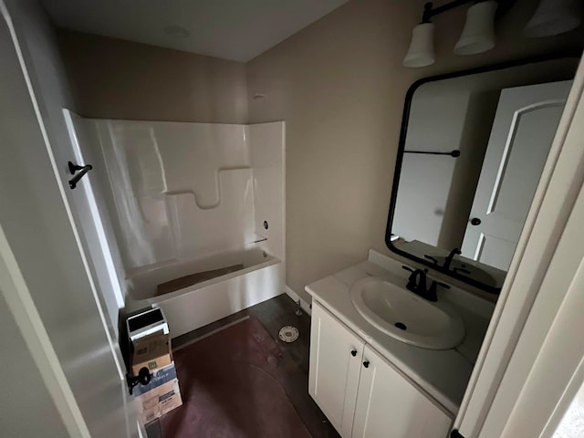 bathroom featuring wood-type flooring, vanity, and shower / bath combination