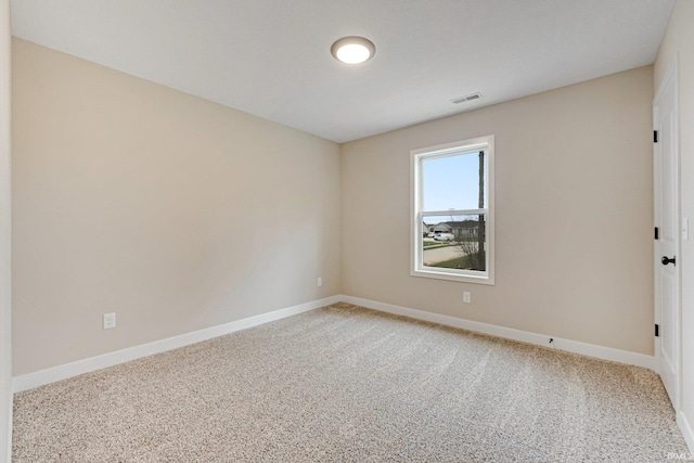 empty room featuring carpet floors