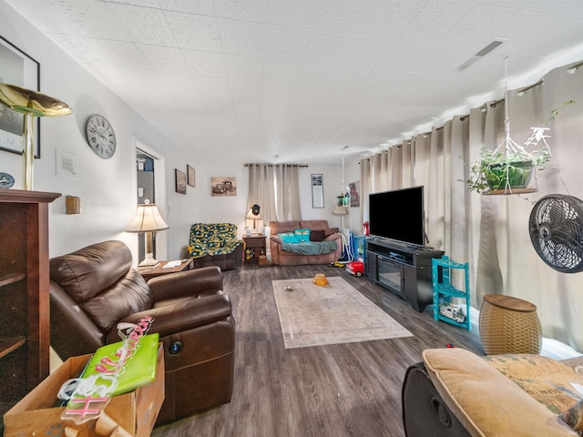 living room featuring dark hardwood / wood-style flooring