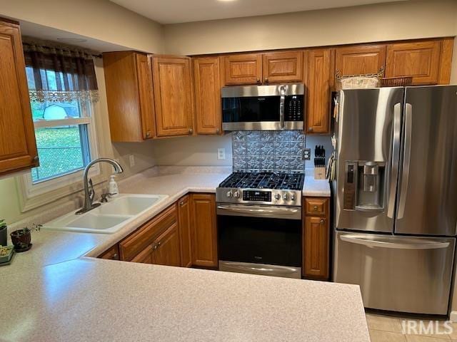 kitchen with appliances with stainless steel finishes and sink