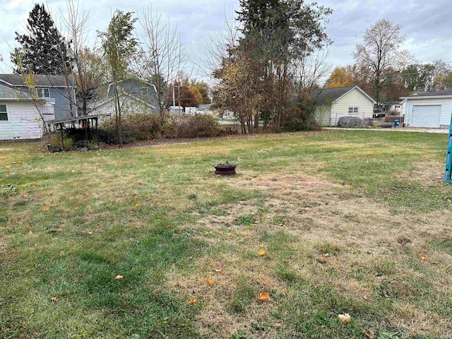 view of yard with a garage