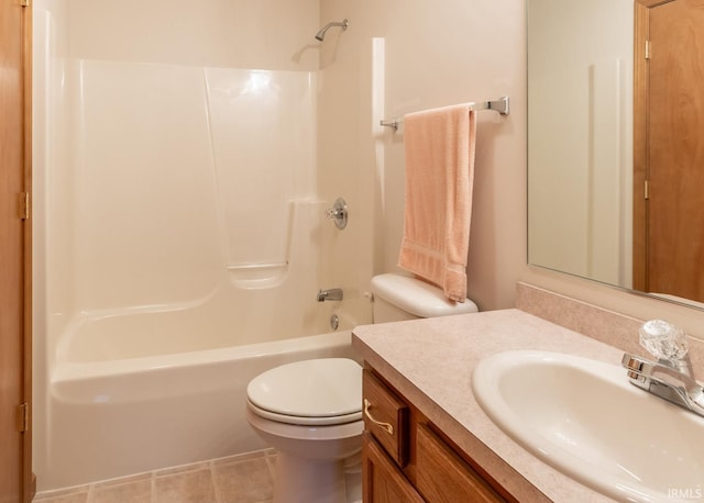 full bathroom featuring vanity, tile patterned flooring, toilet, and bathtub / shower combination