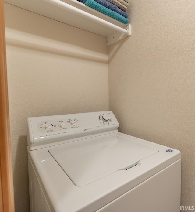 laundry area with washer / dryer