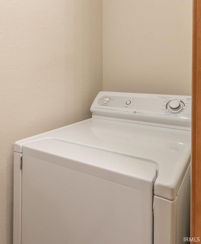 laundry area with washer / dryer