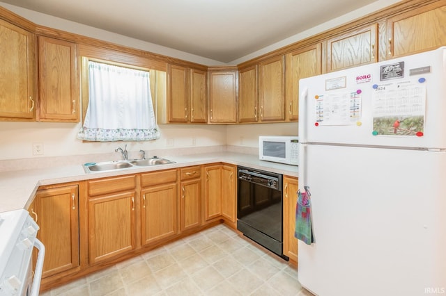 kitchen featuring white appliances and sink