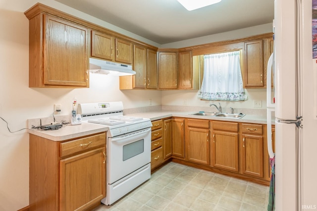 kitchen with white appliances and sink