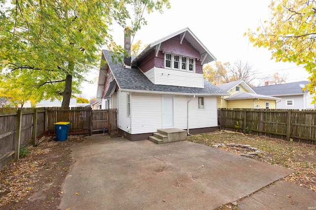 rear view of property with a patio