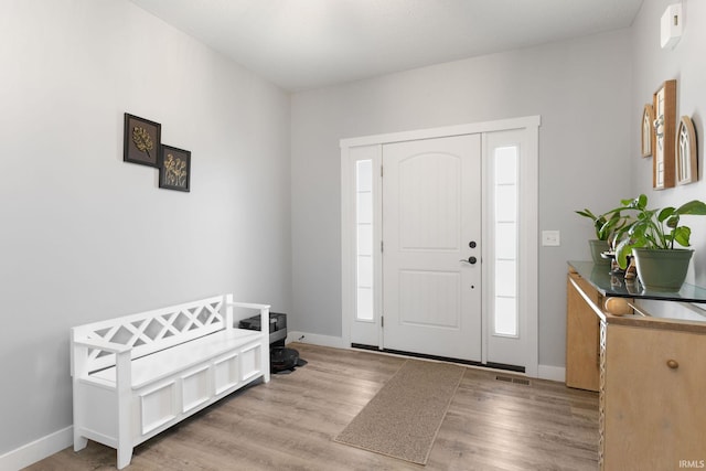 entrance foyer featuring light hardwood / wood-style floors