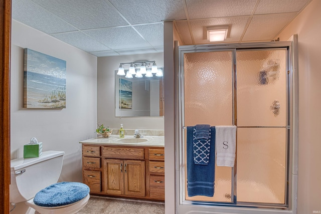 bathroom with vanity, toilet, and walk in shower