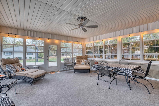 sunroom / solarium with ceiling fan