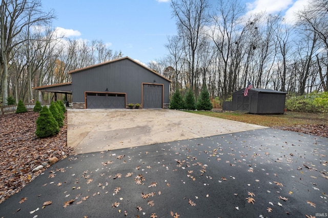 view of side of home with a storage unit