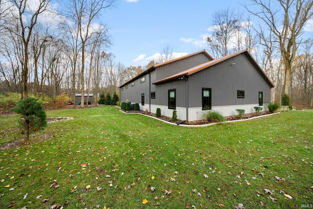 view of home's exterior featuring a yard