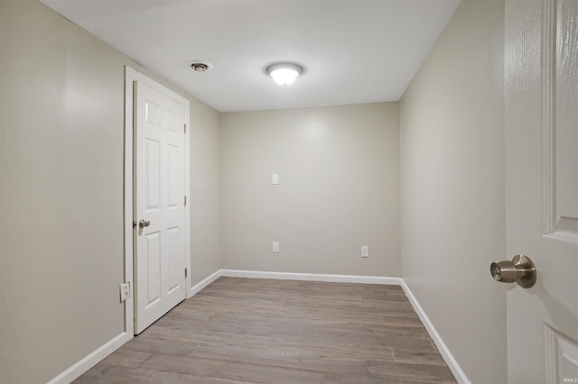 unfurnished room featuring light wood-type flooring