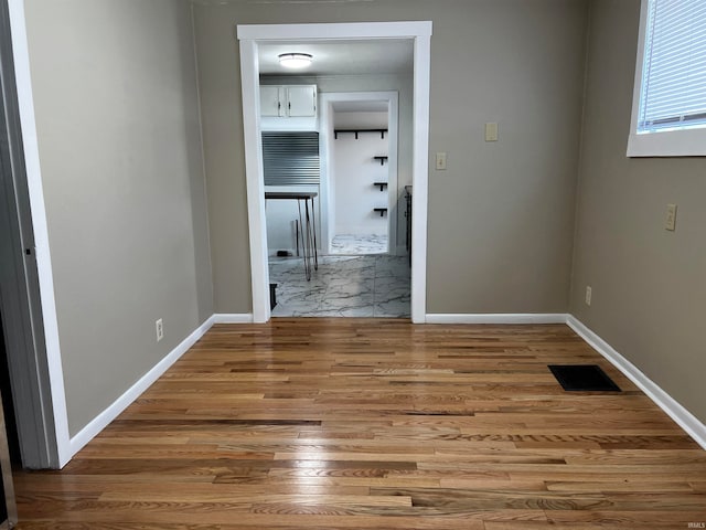 hall featuring hardwood / wood-style flooring