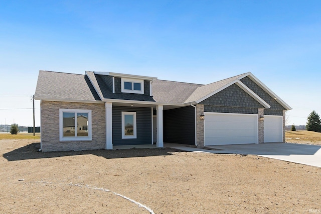 11903 Cross Winds Way, Fort Wayne, IN 46818 - view of front facade featuring an attached garage, driveway, and roof with shingles