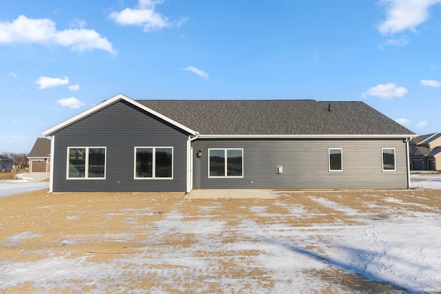 view of snow covered house