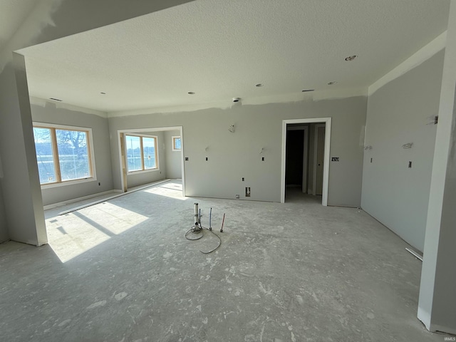 empty room featuring a textured ceiling