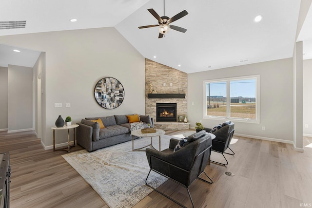 11903 Cross Winds Way, Fort Wayne, IN 46818 - living area with a ceiling fan, light wood-style flooring, a fireplace, high vaulted ceiling, and recessed lighting