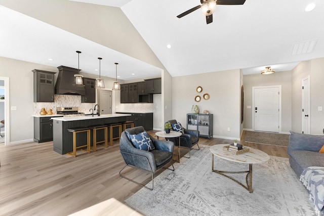 11903 Cross Winds Way, Fort Wayne, IN 46818 - living area with a ceiling fan, light wood finished floors, recessed lighting, and lofted ceiling