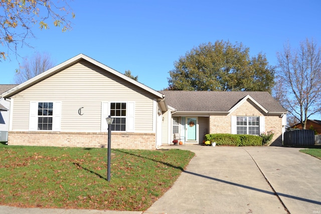 ranch-style house with a front lawn